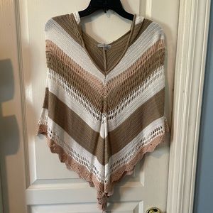 Brown and white poncho